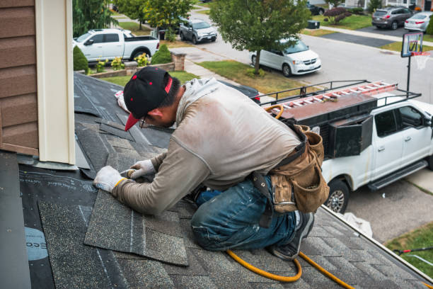Professional Roofing technician working in Morrisville, VT